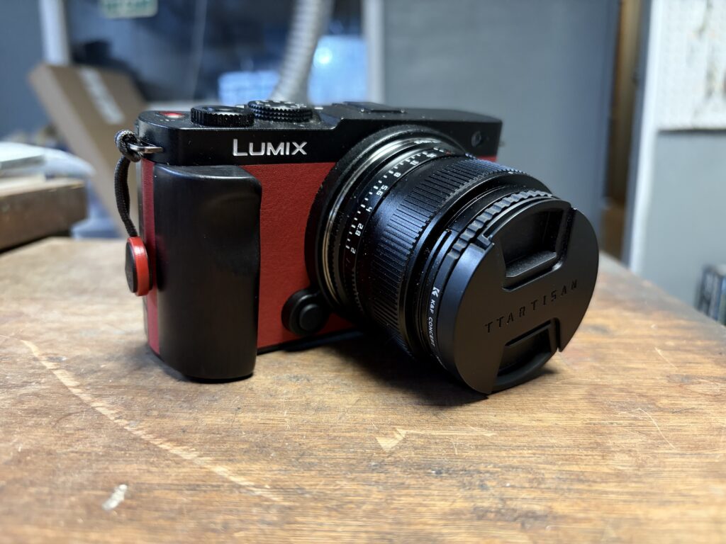 Red Lumix S9 camera with the TT Artisan 40mm f2 lens mounts. 